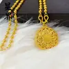 Collar de Cuentas con Brújula Hueca de Ocho Tesoros Chapado en Oro con Colgante Redondo de Carácter de la Fortuna, Colgante Chapado en Oro de Latón al por Mayor