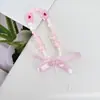 Estilo celebridad de internet moderno colorido hecho a mano con cuentas cadena para teléfono móvil colgante de amor colgante niña bolso adornos para funda de teléfono