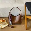 Bolsos de mujer modernos y elegantes 2026 bolso tote de mujer para otoño e invierno bolso de hombro retro simple de gran capacidad