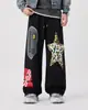 Pantalones deportivos de camuflaje de marca de moda urbana americana para hombres y mujeres, estilo casual, adecuados para street dance y danza jazz, pantalones deportivos de pierna ancha con cordón
