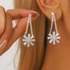 Pendientes de lujo europeos y americanos con diseño de nicho de flores de copo de nieve y diamantes de imitación superbrillantes, pendientes de circonita con temperamento femenino de alta gama