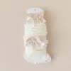 Nuevos estilos de otoño e invierno: calcetines largos engrosados con adorno de lazo para niñas, perfectos para Año Nuevo, proporcionando calor y actuando como calentadores de rodillas y piernas