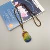 Cadena para suéter de cristal de vidrio de tres colores Guanyin Buda hombres y mujeres valientes cuatro estaciones Joker color collar venta al por mayor fábrica ventas directas