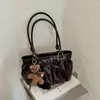 Bolsa de Ombro Único Plissada com Laço Retrô Francês de Outono Nova para Mulheres Grande Capacidade Simples Nicho Bolsa Nuvem de Axila
