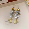 Brincos de Gancho com Tassel de Concha em Formato de Peixe Transfronteiriços Europeus e Americanos, Brincos Exagerados Personalizados, Luxo Acessível, Brincos de Alta Qualidade, Design de Nicho