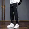 Marca de moda casual para hombre de otoño e invierno, pantalones holgados casuales para el trabajo, tobilleros, nuevos jeans deportivos lavados de moda para hombre 2023