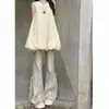 Jeans Acampanados de Dobladillo Crudo Estilo Retro Americano para Mujer 2026 Nuevo Estilo Otoño Adelgazantes Versátiles Pantalones de Trompeta de Dobladillo Crudo Micro Acampanados