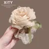 Diadema de malla con rosa súper de hada para mujer, nuevo estilo dulce, adecuada para peinados de moño, banda elástica, accesorio de alta gama para coleta y recogido