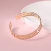 Pulseira europeia e americana de comércio exterior mais vendida, pulseira personalizada, pulseira de abertura dourada simples com estrelas vazadas, joalheria, vendas diretas da fábrica