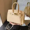 Bolsa Kelly Retrô Tendência Padrão Crocodilo para Mulheres 2026 Novo Modelo Moda de Alto Padrão Bolsa Transversal Versátil Platina