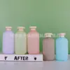 Botella de loción con tapa abatible de 300 ml de material de felpa PE con manchas, loción corporal, champú, gel de ducha, botella de loción, botella cosmética