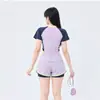 Nuevo traje de baño para mujer, conjunto de dos piezas con parte de abajo separada, estilo deportivo, media cremallera, secado rápido, para adultos, adecuado para aguas termales y resorts, al por mayor