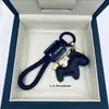 Fique Rico Imediatamente Pingente de Chaveiro de Couro de Vaca Feito à Mão para Carro Lanyard Elegante Simples Exquisito para Casais Masculinos e Femininos
