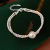 Conjunto de Colar com Pingente Redondo de Metal e Pulseira de Pérolas Estilo Palácio Retrô Francês Nicho de Luxo Versátil Joias