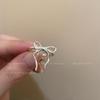 Nuevo anillo abierto con lazo de cinta francesa, diseño de nicho, anillo de dedo femenino de alta gama, combinable y distintivo.
