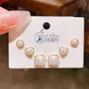 Verano nuevo chapado en oro real exquisitos tres pares de aretes pequeños de alto sentido pequeños frescos dulces aretes de temperamento combinables