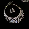 Aretes y collar de dos piezas con colgante de flor y gota de agua incrustados con diamantes, cadena para la clavícula de moda y exquisita, joyería de lujo ligero y de alta gama para mujer