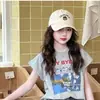 Conjunto de Verano Retro Elegante para Niñas 2026 Nuevo Conjunto de Dos Piezas con Camiseta de Manga Corta a Cuadros y Falda Elegante