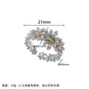 Anillo de margarita pequeño, moderno y exquisito para mujer, lujo ligero con un diseño de alta gama, anillo abierto de circón de flor para el dedo índice, venta al por mayor