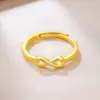 Accesorios de Venta Caliente Transfronterizos Anillo con Símbolo Infinito en Forma de Cruz Hueca de Oro de 18 Quilates Anillo Infinito Original Creativo
