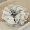 Goma para el pelo de estilo coreano con diseño de lunares y flores en ambos lados, Diadema dulce y de moda para coleta, Cuerda elegante para el pelo de celebridad de Internet