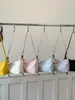 Bolso de moda coreana elegante para mujer con estampado de lichi, bolso tipo dumpling, nuevo bolso de hombro y cruzado simple de verano 2026 para el día a día