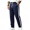 2026 Europeu e Americano Transfronteiriço Outono Inverno Casual Masculino Simples Solto Esportivo Bloco de Cores Perna Reta Jogging Versátil Calça de Moletom Atacado