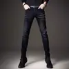 Jeans preto puro de Hong Kong para homens, nova coleção primavera/outono 2026, calça cigarette slim fit moderna, calças casuais elásticas