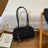 Bolso de mano casual y versátil de lunares para mujer, nueva colección otoño/invierno 2026, bolso de hombro de moda estilo coreano, de alta calidad y elegante