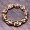 Al por mayor estilo Xizang intemperie alto en aceite ágata viejo nueve ojos bendición familiar pulsera Tianzhu ágata pulsera Tianzhu Duobao