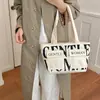 Bolso tote de moda de nicho para mujer de este año, nueva colección otoño 2026, bolso de hombro con estampado de letras, bolso bandolera para ir al trabajo
