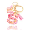 Llavero de moda con letras rosas, lentejuelas de amor, borla de mariposa, llavero, accesorios de colgante de epoxi de cristal para damas