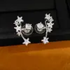 Brincos assimétricos multi-uso com zircônia em formato de estrela e pino de prata, brincos únicos e estilosos de nicho com um toque de luxo leve e de alta qualidade
