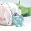 Venta al por mayor de fábrica botella de perfume de jade con forma de corazón de durazno, polvo de cristal, fluorita de cristal, amor, botella de aromaterapia, botella de aceite esencial, colgante de joyería
