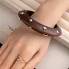 Pulsera de Madera Geométrica Remachada Retro Europea y Americana Nicho de Moda Genial Exagerada Accesorios de Pulsera Exportación Joyería a Mano Joyería Transfronteriza