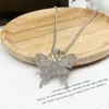 Collar de mariposa con incrustaciones de diamantes europeo y americano, colgante de moda cool para chica popular, cadena larga para suéter de moda hip hop callejero, personalidad para hombres y mujeres