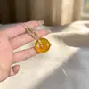 Fivela Natural de Paz Ágata, atacado do fabricante, ágata de gelo amarelo óleo de galinha natural, pingente cor de âmbar, versátil e elegante