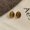 Pendientes Colgantes Populares de Piedra Ojo de Tigre Aguja de Plata Maillard Retro Elegantes Versátiles Pendientes de Lujo Accesible Pendientes de Gama Alta para Mujeres