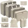 Set organizador de viaje premium, incluye 11 piezas: bolsas para guardar ropa, bolsas con cordón, bolsas para cosméticos y artículos de tocador, y bolsas de malla plegables para almacenamiento
