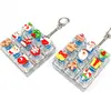 Navidad 9 Teclas Alivio del Estrés Botón Luminoso Juguete para Aliviar el Estrés Keycap Llavero Teclado DIY Juguete para Aliviar el Estrés Colgante