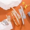 Pulsera popular europea y americana galvanizada de oro real de 18 quilates con platino real, traje de preservación de color, anillo de pulsera abierto de circón de alto temperamento.