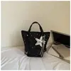 Bolsa escolar grande de estudante estilo coreano ins estrela para o dia a dia 2026 novo modelo bolsa tote casual chic de ombro único