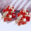 Entrada Nueva de Verano Lujo Ligero Mariposa Sentido Avanzado Personalizado Europeo y Americano Flor de Diamante Rosa Pendientes Pendientes de Explosión de Deseos