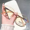 2023 nuevo estilo coreano retro marco redondo grande tachuelas de arroz TR90 anti-luz azul gafas libro rojo con miopía