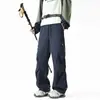 Pantalones tácticos softshell a prueba de agua, viento y suciedad de color azul marino para hombres y mujeres, pantalones cargo tipo paracaidista plisados estilo americano para otoño, pantalones para senderismo al aire libre