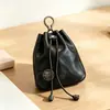 Bolsa para monedas de piel de vaca de capa superior, tarjetero vintage de cuero genuino, bolso pequeño colgante, bolsa con cordón multifuncional transfronteriza