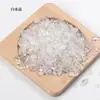 Venta al por mayor de fábrica Piedra triturada de cristal natural Cristal blanco Cuarzo rosa Piedra de cristal amarillo Materiales hechos a mano para decoración de uñas Piedra desmagnetizadora de cristal