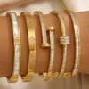 Pulsera de Clavo de Doble Punta Impermeable Europea y Americana Transfronteriza, Resistente al Desgaste, de Acero de Titanio Incrustada con Diamantes, Moderna y Versátil, Lujo Ligero con un Toque de Alta Gama