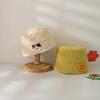 Sombrero infantil estilo Corea del Sur primavera nuevo lindo pegatinas de dibujos animados sombrero tipo cubeta de copa plana sombrero de pescador para bebé a prueba de sol para viaje