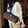 Moderna Retro 2026 Nueva Llegada Otoño Mujer Alta Gama Para Viajar Gran Capacidad Diaria Nicho Bolso de Hombro Único de Mano Debajo del Brazo